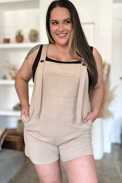 Khaki sleeveless romper with textured fabric, full size, from Trendsi's Double Take collection, featuring a casual and stylish design.