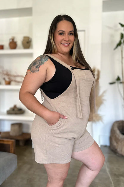 Khaki double take full-size texture sleeveless romper by Trendsi, featuring a stylish sleeveless design and textured fabric.