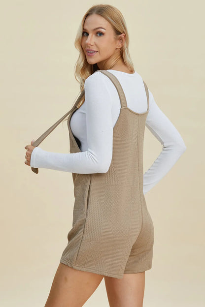 Khaki sleeveless romper from Trendsi featuring a textured full-size design and a stylish, modern fit.