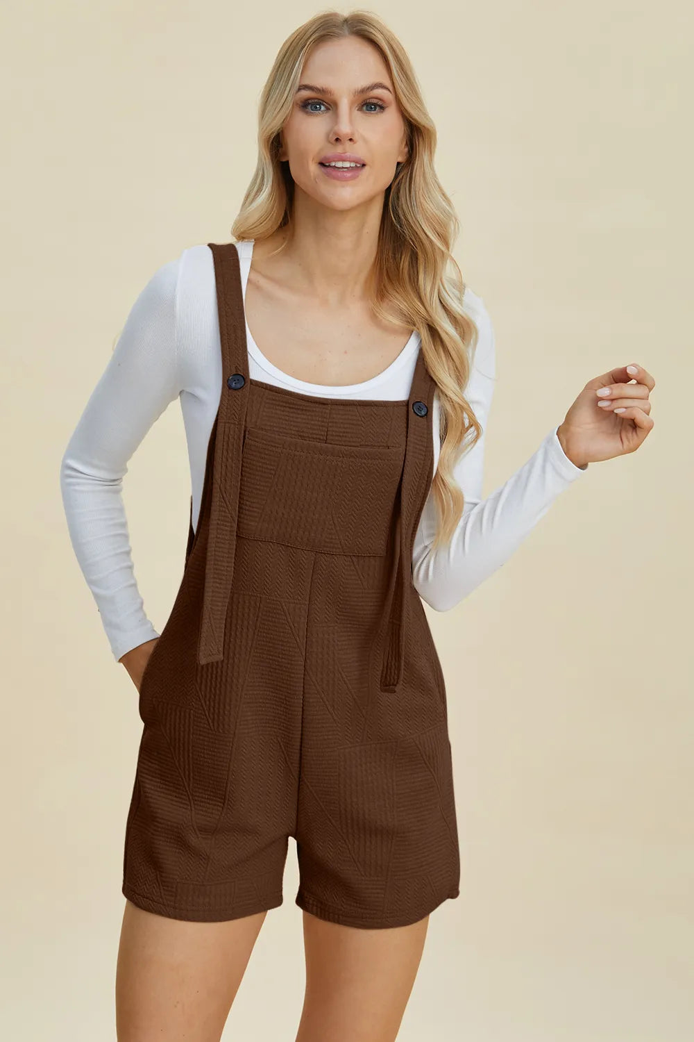 Khaki sleeveless romper with textured fabric, featuring a full size fit and stylish design by Trendsi.