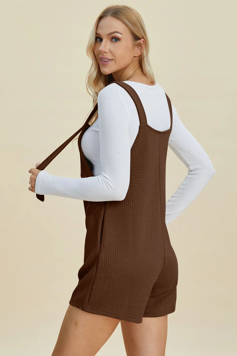 Khaki sleeveless romper with textured fabric from Trendsi, featuring a full size fit and stylish design.