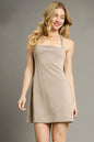 Khaki Umgee crisscross square neck active dress by Trendsi, shown in size XS, featuring a stylish square neckline and casual fit.