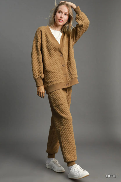 Trendsi Umgee button-up jacquard cardigan in latte color, featuring a textured pattern and classic button closure.