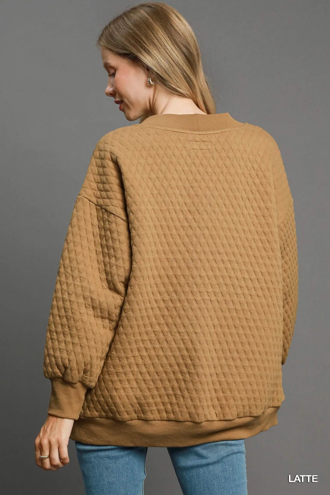 Light latte Umgee button-up jacquard cardigan with intricate knit pattern, styled for a cozy, fashionable look.