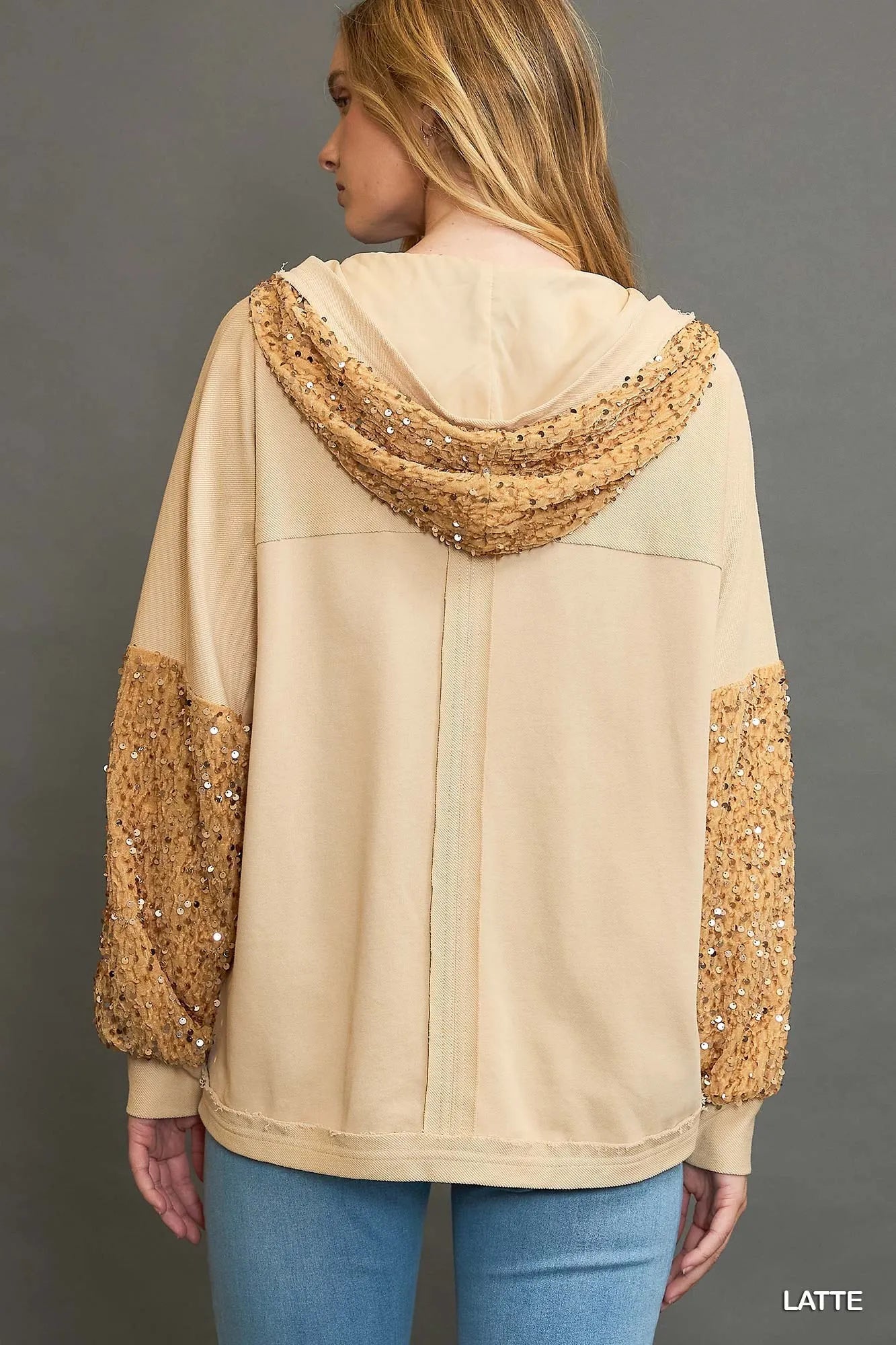 Light latte-colored Umgee sequined French terry jacket with a relaxed fit and subtle shimmer, perfect for casual and stylish wear.