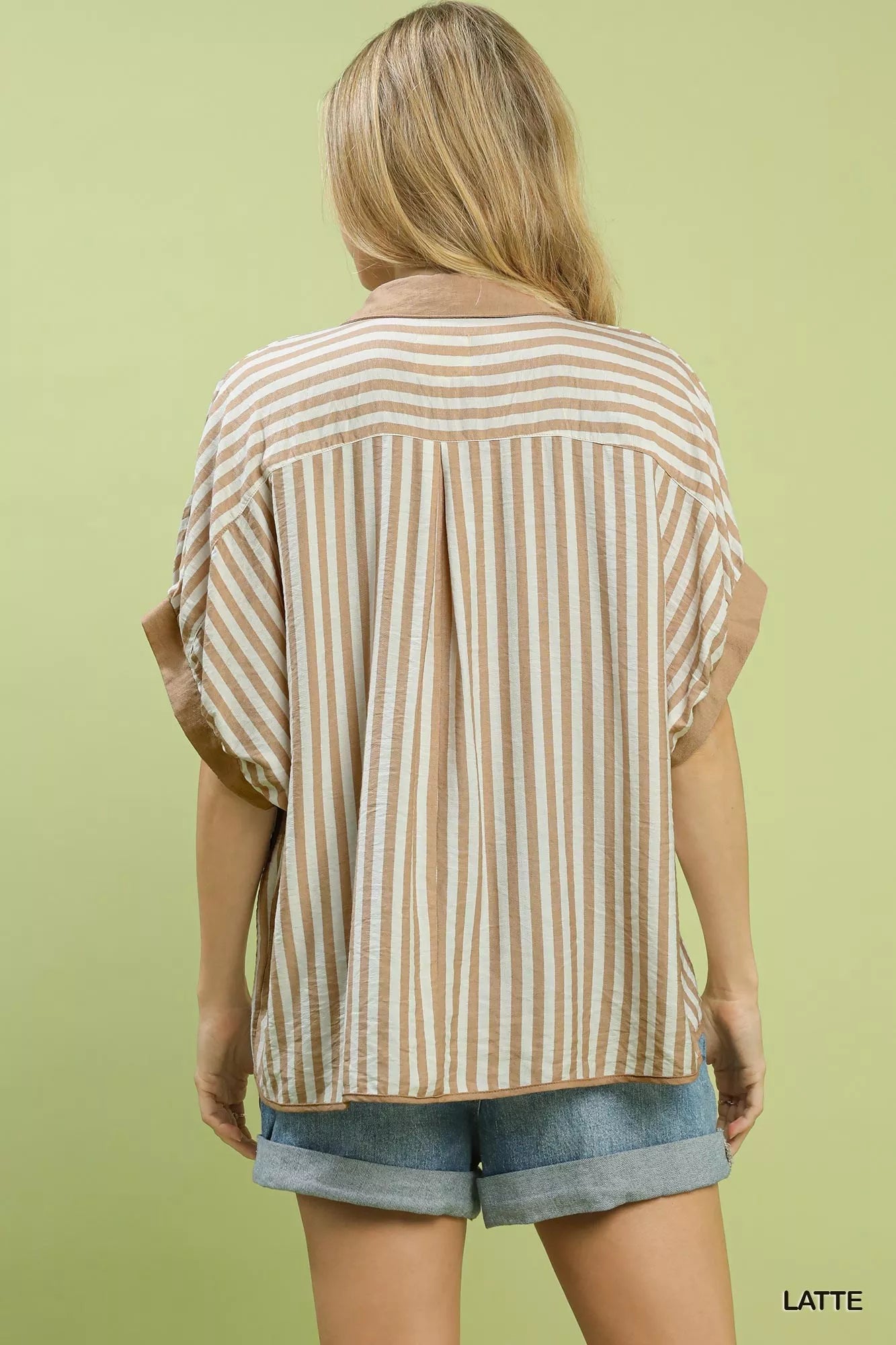 Latte-colored Umgee oversized striped collared top with relaxed fit and long sleeves, styled casually for a comfortable look.