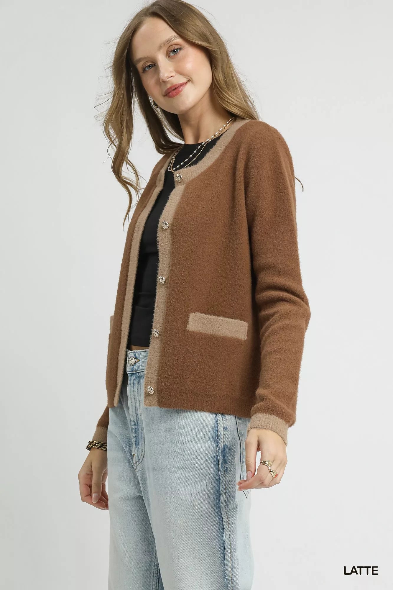Light beige and taupe two-tone Umgee button-front cardigan with long sleeves and front pockets.