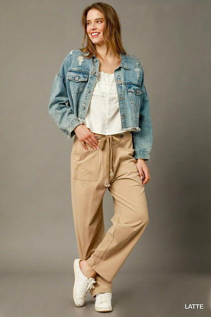 Light brown cargo-inspired drawstring pants from Umgee, styled with a relaxed fit and functional pockets.
