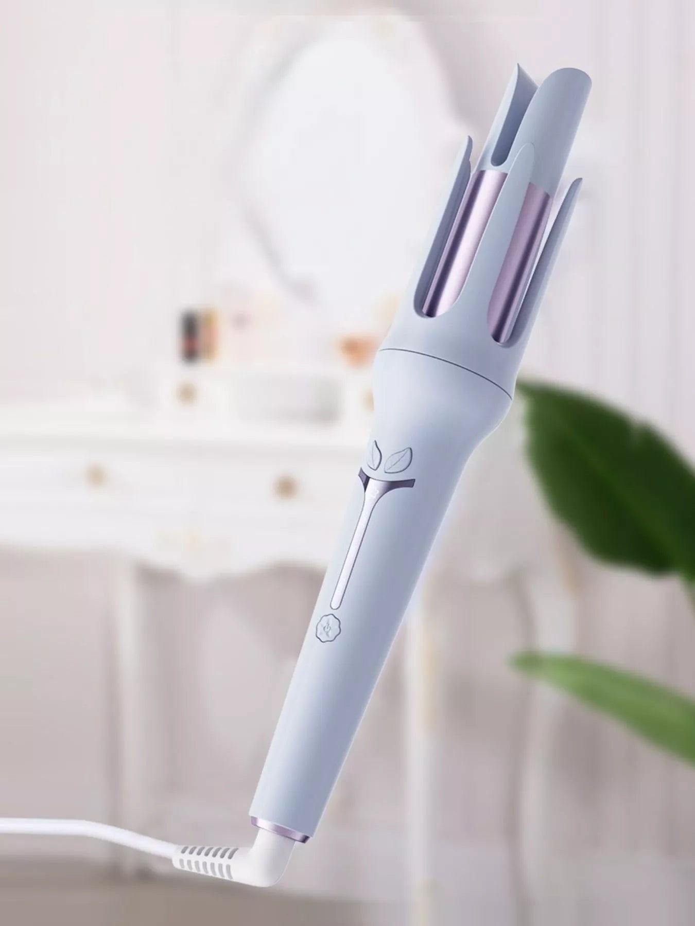 Lavender Trendsi automatic rotating hair curling iron with European plug, showcasing its sleek design and curling barrel.