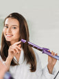 Lavender Trendsi temperature-control heating curling iron with European plug for versatile styling and easy handling.