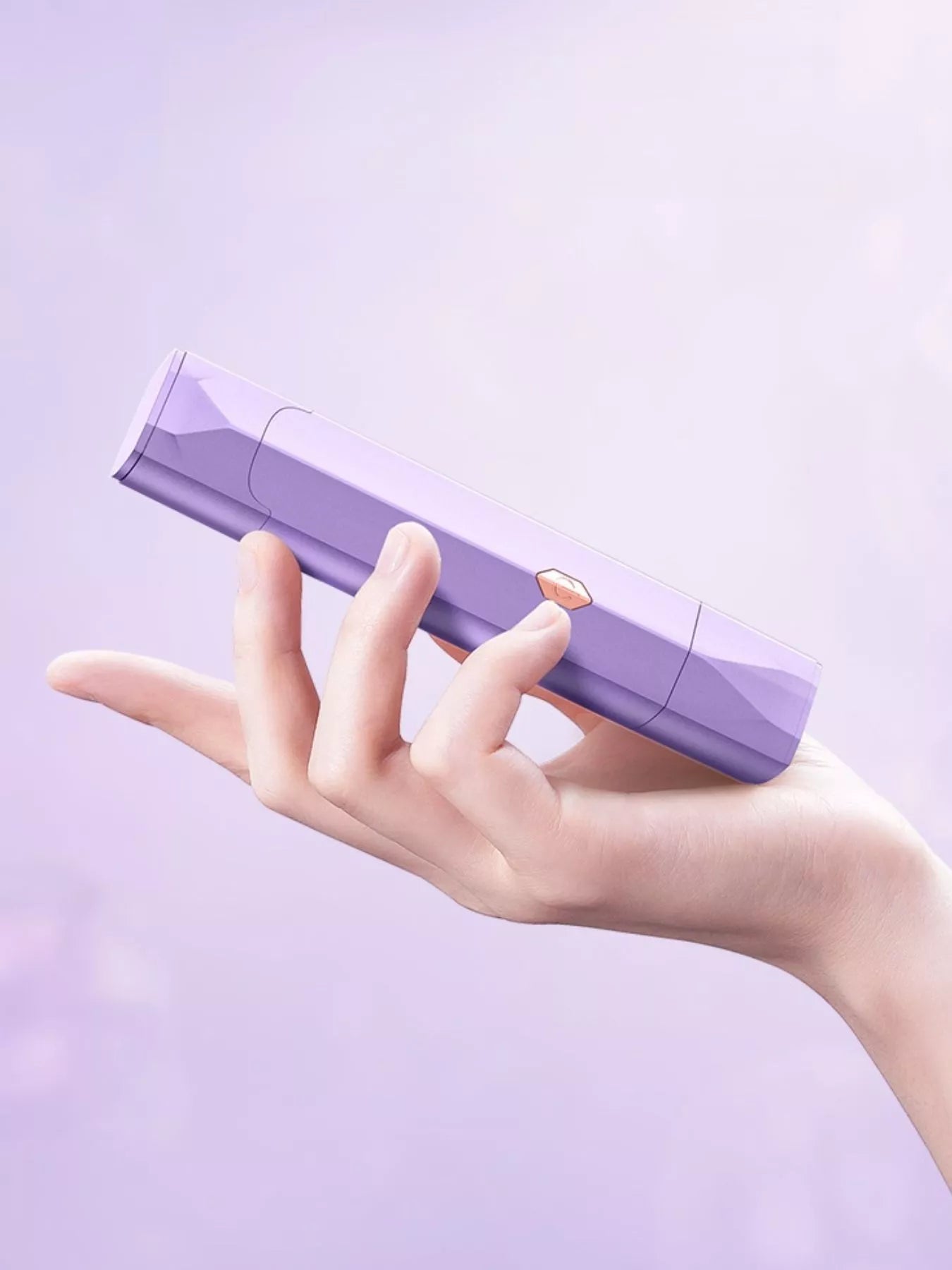Lavender portable hair removal epilator by Trendsi with compact design and multiple attachments for easy, at-home use.