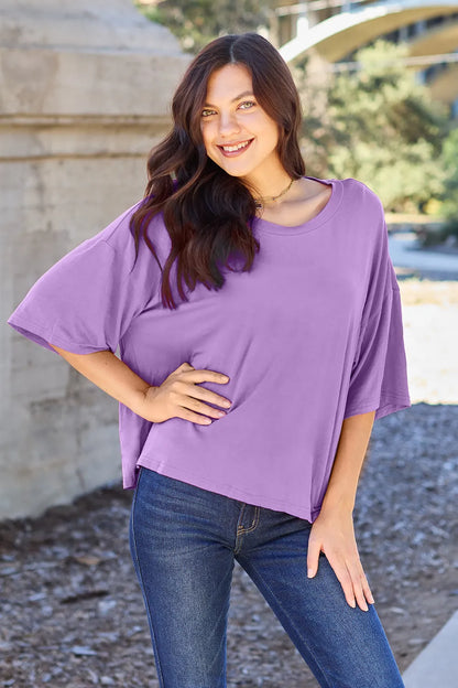 Lavender Basic Bae bamboo full-size round neck drop shoulder T-shirt by Trendsi, casual and comfortable for everyday wear.