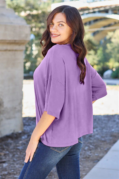 Lavender Basic Bae bamboo full-size round neck drop shoulder T-shirt by Trendsi, soft and comfortable casual top for women.