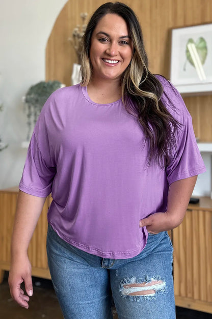 Lavender Basic Bae bamboo full-size round neck drop shoulder T-shirt by Trendsi, showcasing soft fabric and relaxed fit.
