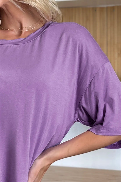 Lavender Basic Bae bamboo T-shirt by Trendsi featuring a full-size round neck and drop shoulder design.