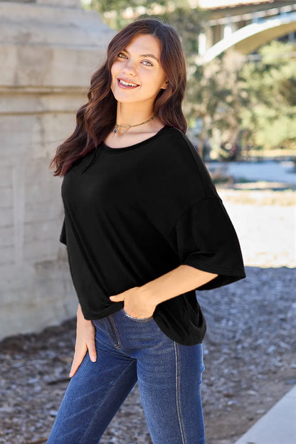 Lavender bamboo T-shirt by Trendsi featuring a full-size round neck and drop shoulder design, casual and comfortable fit.