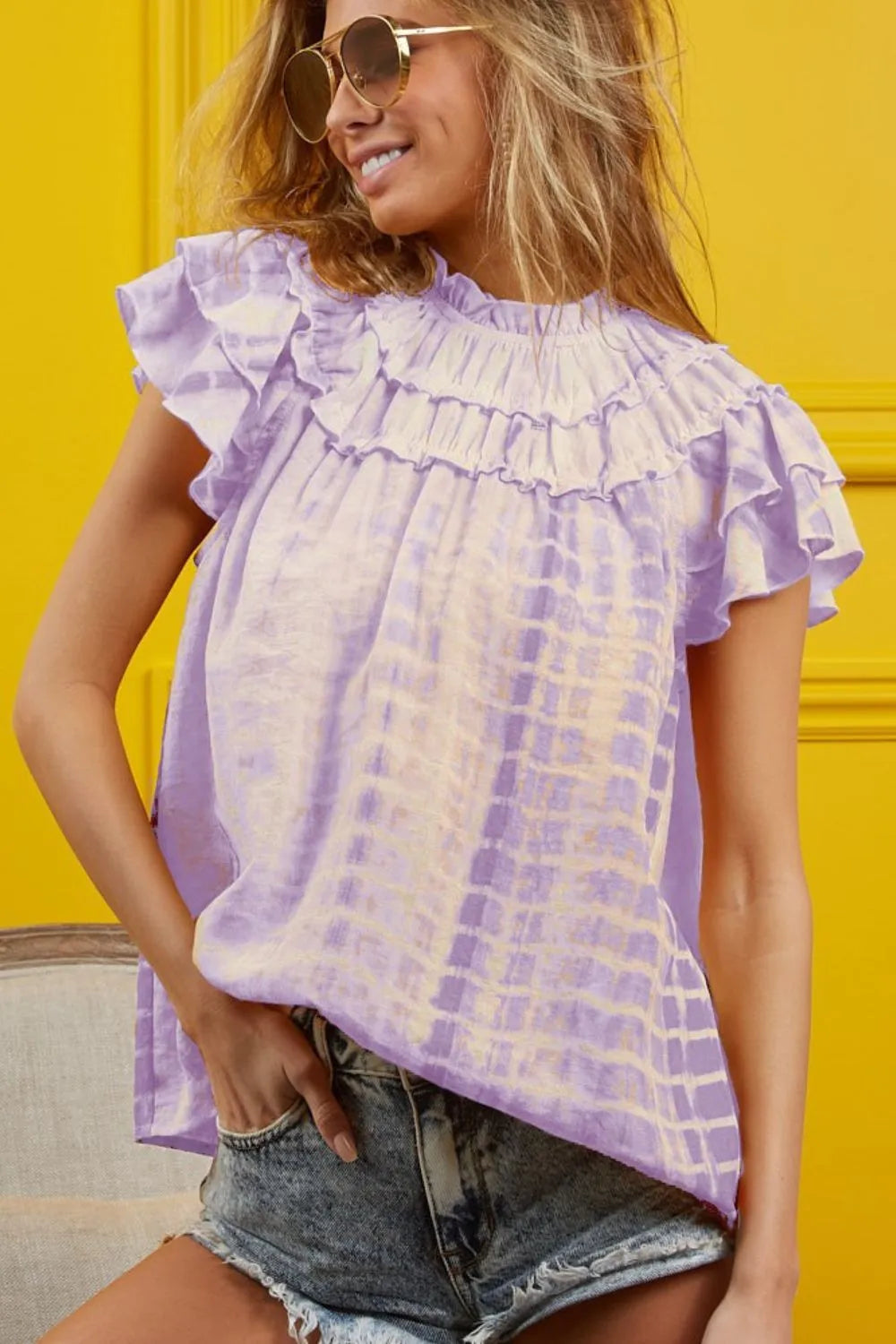 Lavender BiBi tiered ruffle neck tie dye top by Trendsi, featuring layered ruffles and vibrant tie dye pattern.