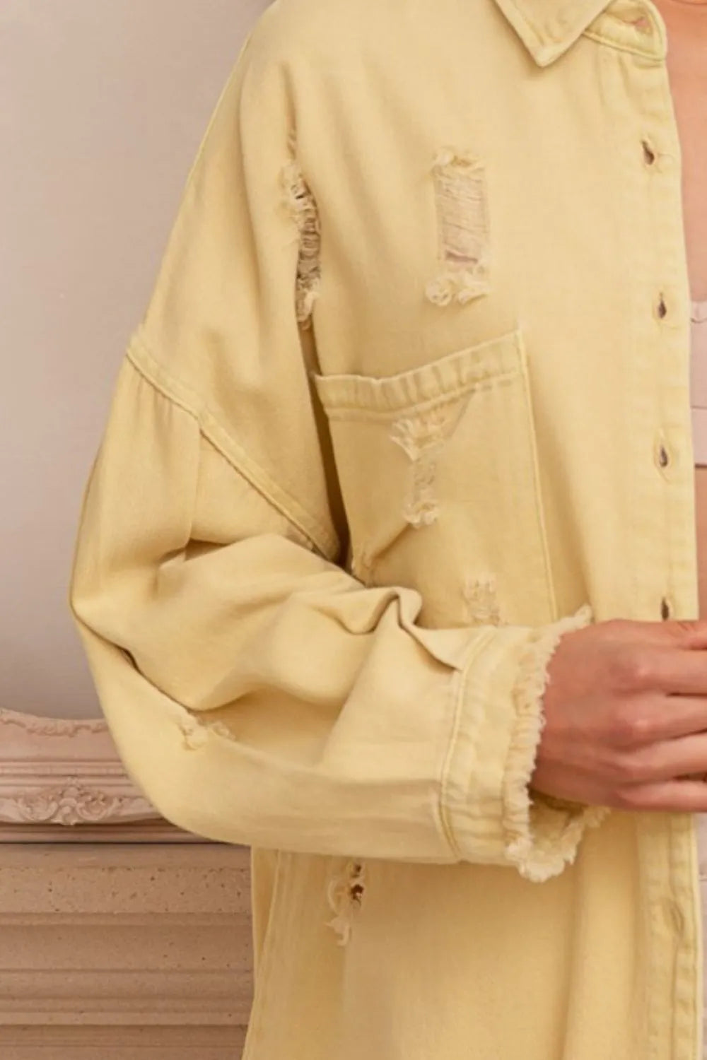 Trendsi lemonade POL button-down raw hem distressed shacket featuring a casual, stylish design with distressed details and a relaxed fit.