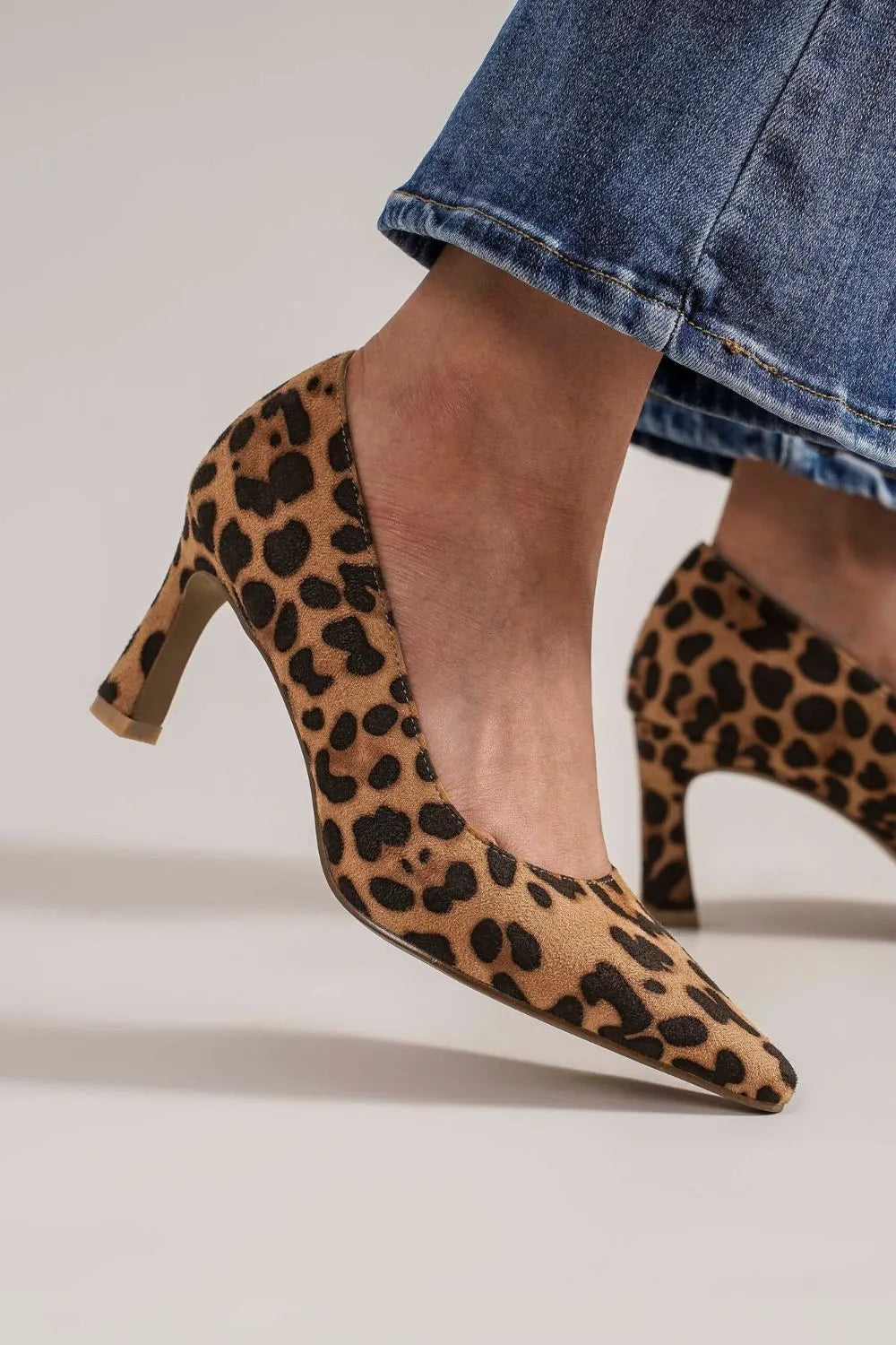 Beast Fashion faux suede leopard print point toe pumps with stiletto heel, stylish women's footwear by Trendsi.