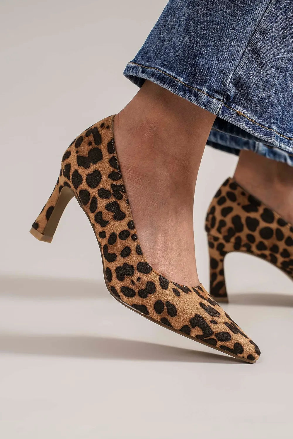 Beast Fashion faux suede leopard print point toe pumps with stiletto heel, stylish women's footwear from Trendsi.