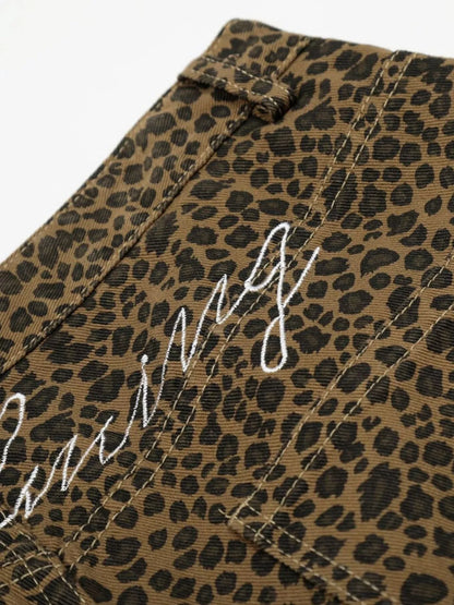 Men's leopard print wide-leg capris by Trendsi featuring a stylish animal print and relaxed fit.