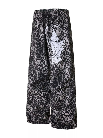Men's Leopard Print Wide-Leg Pants in bold leopard pattern, featuring a relaxed fit and wide-leg silhouette from Trendsi.