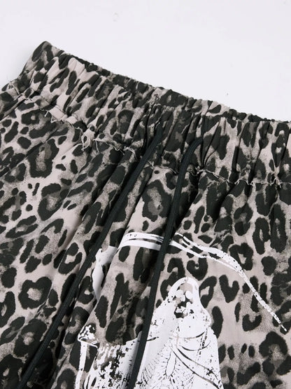 Men's leopard print wide-leg pants by Trendsi, featuring a bold leopard pattern, relaxed fit, and stylish wide silhouette.