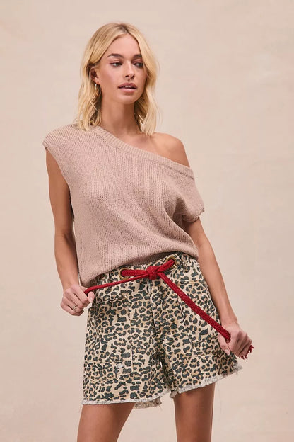 Leopard print shorts by Trendsi featuring a braided waist belt and patch pockets, designed for a stylish, casual look.