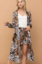 Leopard print kimono and shorts set by Trendsi, featuring animal print fabric, styled for a casual, trendy look.