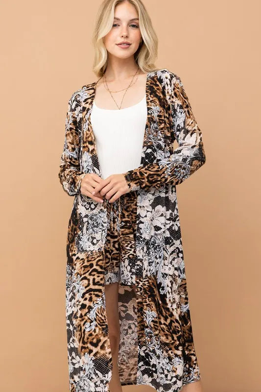 Leopard print kimono and shorts set from And The Why by Trendsi, featuring a stylish animal print design and lightweight fabric.