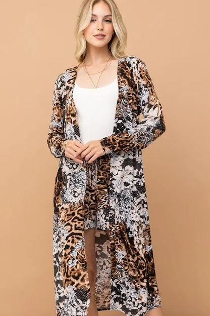 Leopard print kimono and shorts set from And The Why by Trendsi, featuring a stylish animal print design and lightweight fabric.