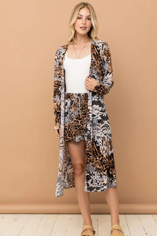 Leopard print kimono and shorts set by Trendsi featuring animal print fabric, lightweight design, and relaxed fit.