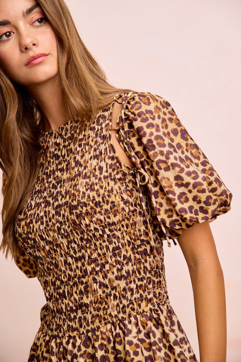 Trendsi BiBi leopard bow tie dress with attachable puff sleeves, featuring a stylish leopard print and elegant design.