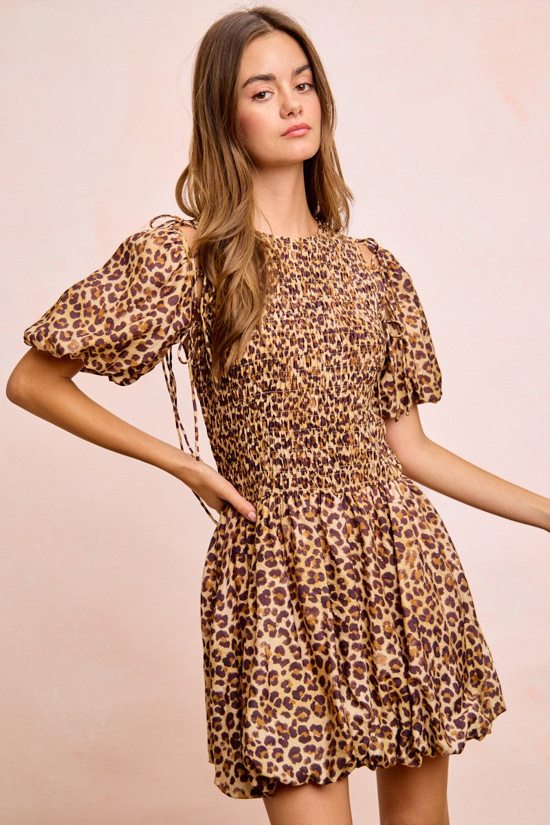 Trendsi BiBi Leopard Bow Tie Attachable Puff Sleeves Dress featuring a leopard print, bow tie detail, and puff sleeves on a stylish dress.