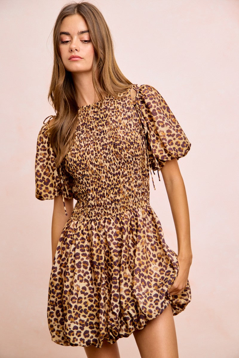 Trendsi BiBi leopard bow tie attachable puff sleeves dress with stylish leopard print and puffed sleeve details.