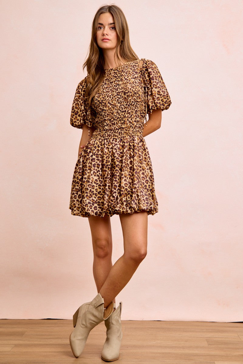 Trendsi BiBi Leopard Bow Tie Attachable Puff Sleeves Dress featuring leopard print, bow tie detail, and puff sleeves for stylish wear.