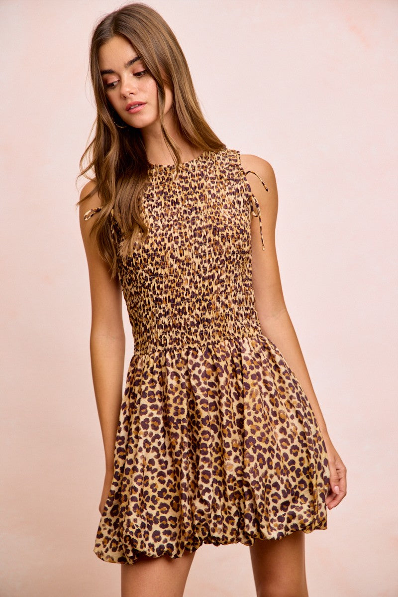 Trendsi BiBi Leopard bow tie dress with attachable puff sleeves and a stylish leopard print design.