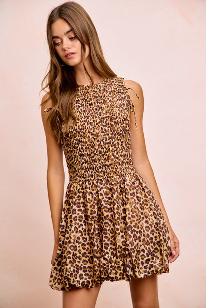 Trendsi BiBi Leopard bow tie dress with attachable puff sleeves and a stylish leopard print design.