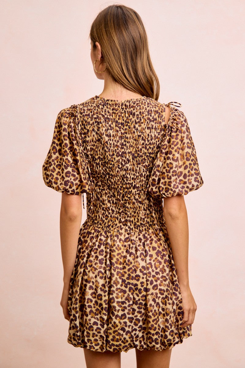 Trendsi BiBi Leopard Bow Tie Attachable Puff Sleeves Dress featuring a leopard print, bow tie detail, and puff sleeves.