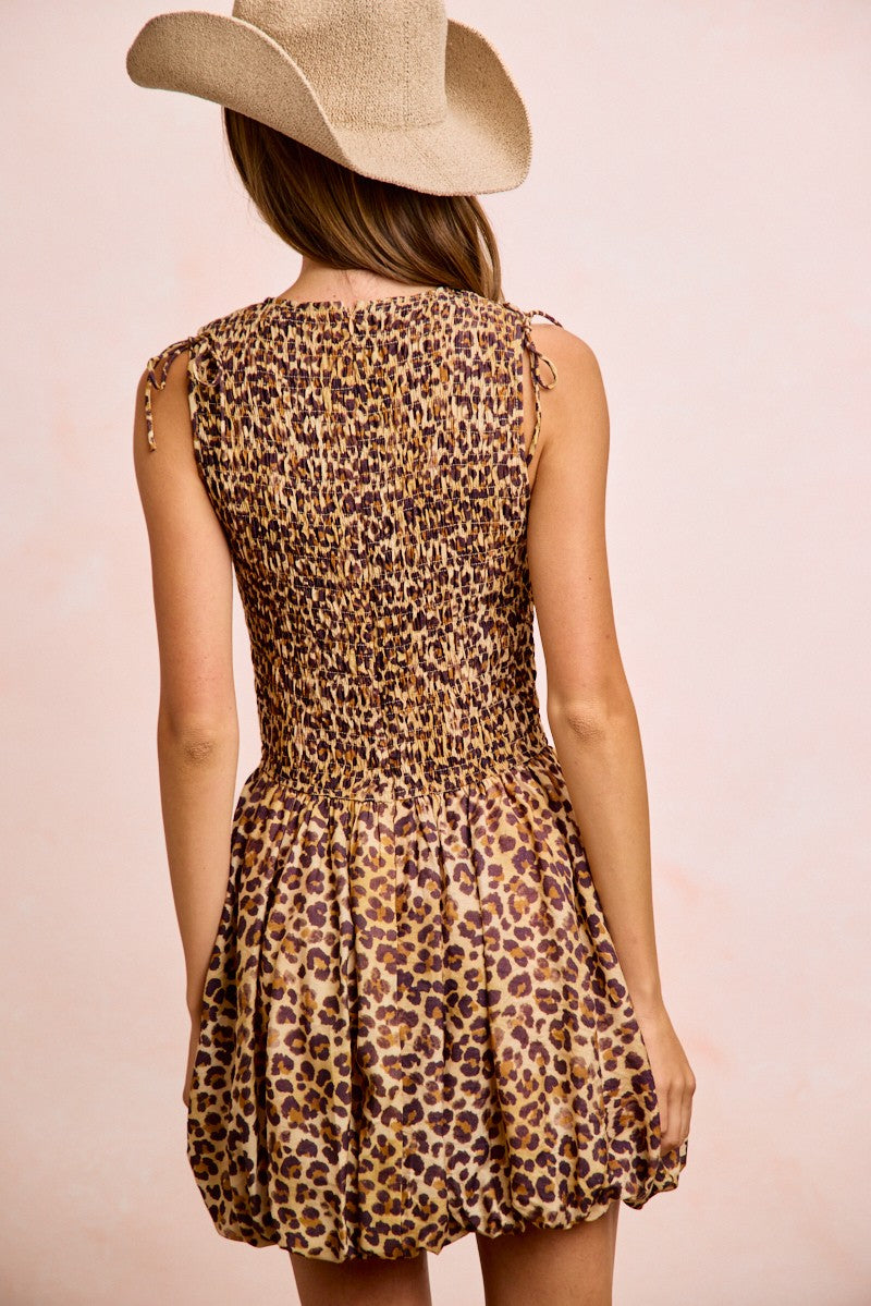 Trendsi BiBi Leopard Bow Tie Puff Sleeves Dress featuring a leopard print, bow tie detail, and attachable puff sleeves.
