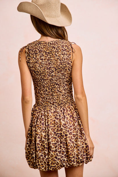 Trendsi BiBi Leopard Bow Tie Puff Sleeves Dress featuring a leopard print, bow tie detail, and attachable puff sleeves.