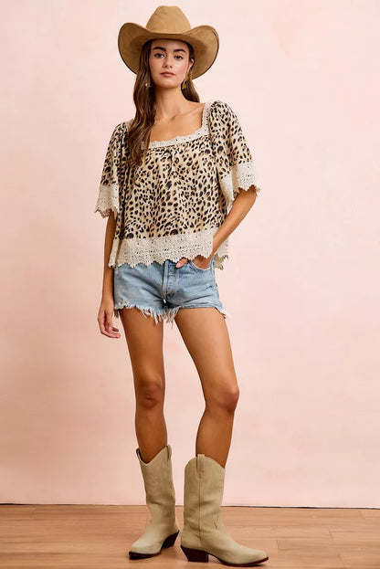 Leopard print lace-up square neckline top from BiBi by Trendsi with mixed animal print details and long sleeves.