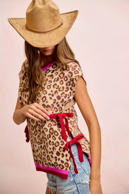 Leopard pattern side-tied sweater vest top by Trendsi featuring a stylish, casual design with a cozy knit texture.