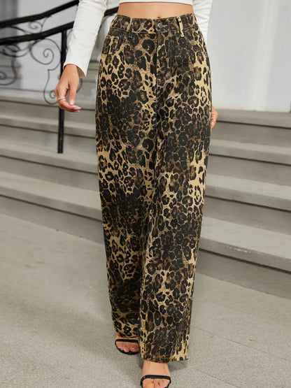 Leopard print jeans from Trendsi with front and back pockets, fitted style, and bold animal print design.