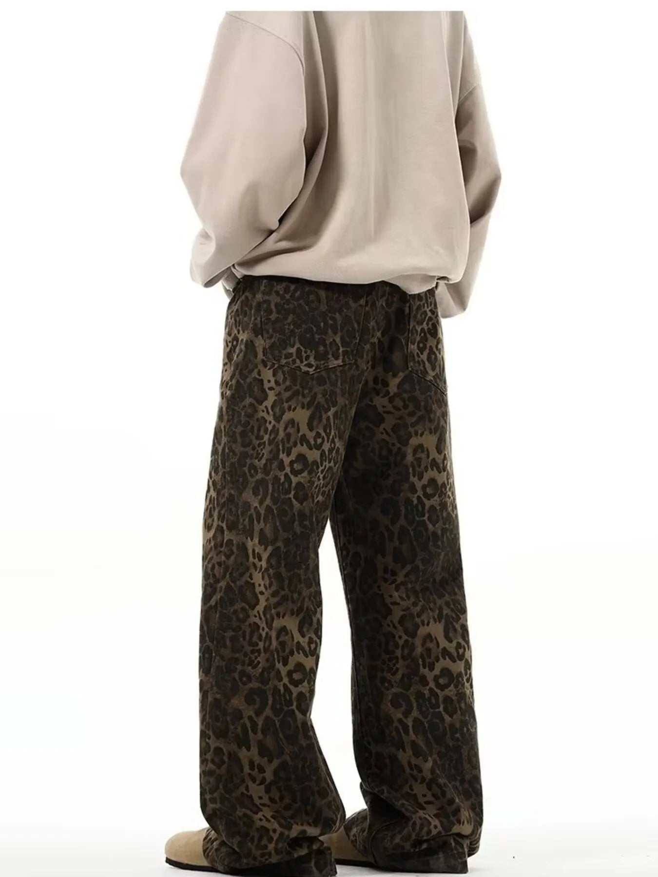 Men's full-size leopard print wide-leg jeans by Trendsi, featuring a bold leopard pattern and relaxed fit for stylish comfort.