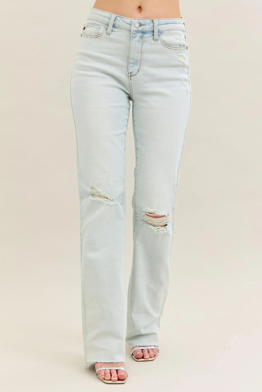 Plus size Judy Blue bootcut jeans with distressed and frayed hem, showcasing a full-length view of the trendy destroy detail.