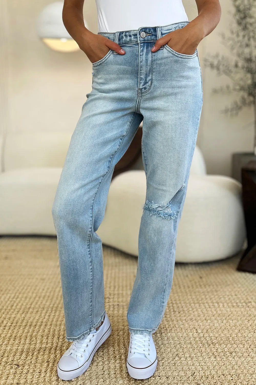 Light-wash Judy Blue high waist distressed straight jeans with frayed hems and classic five-pocket design.