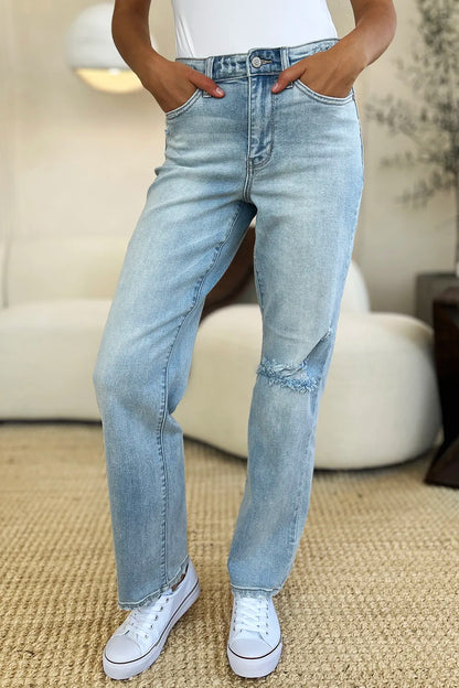 Light-wash Judy Blue high waist distressed straight jeans with frayed hems and classic five-pocket design.
