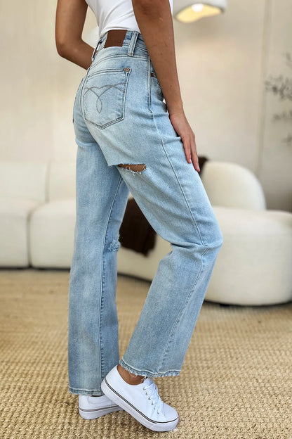 Light wash Judy Blue high waist distressed straight jeans with frayed hems and classic five-pocket design.