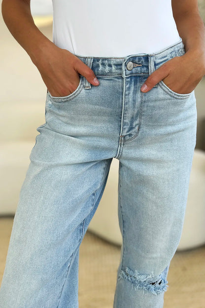 Light blue Judy Blue high waist distressed straight jeans, full size, featuring ripped detailing and classic fit.